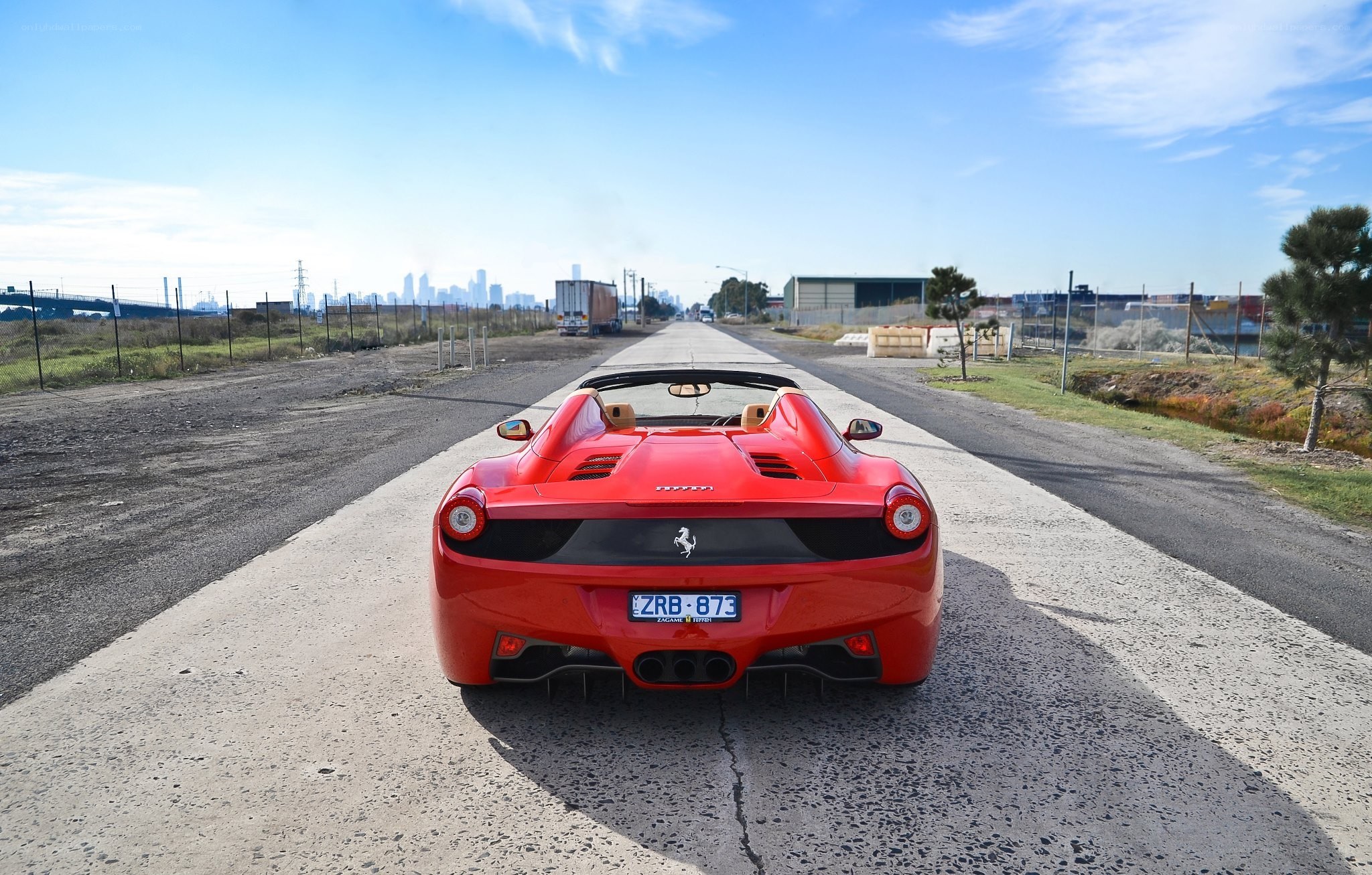Red Ferrari on a road