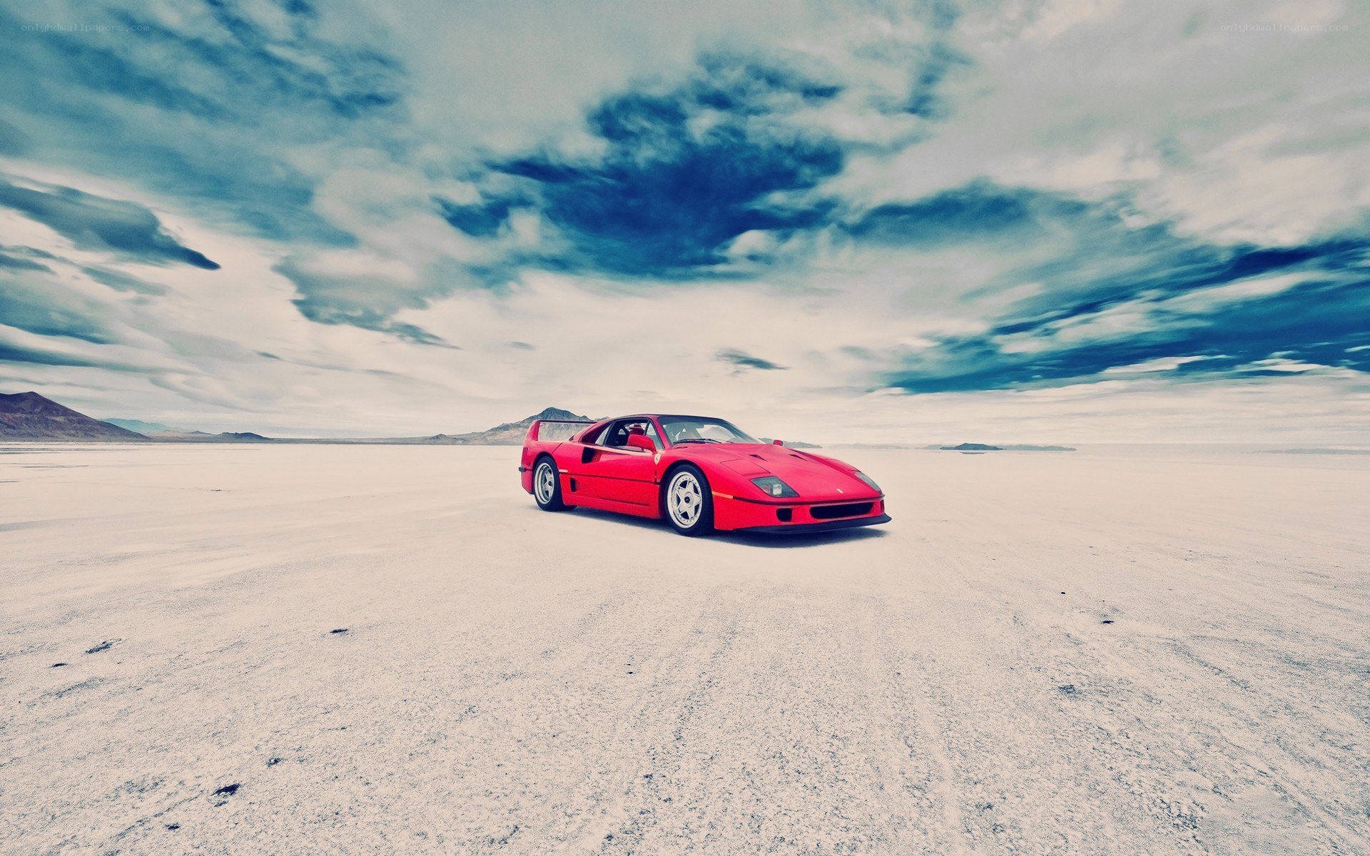 Red Ferrari on a salt flat