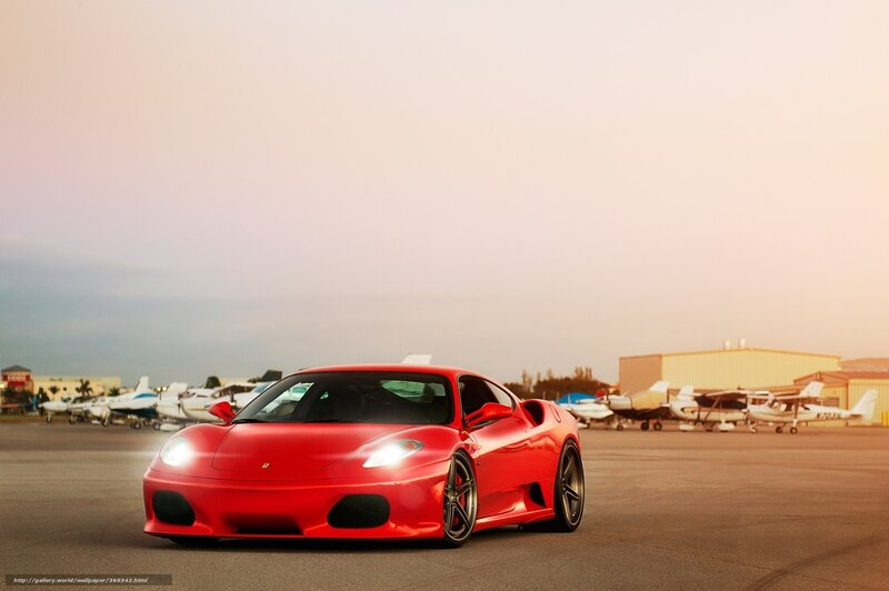 Red Ferrari on airfield