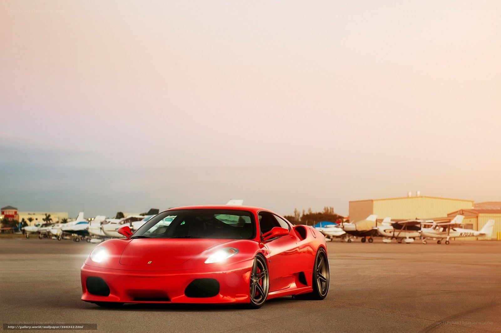 Red Ferrari on airfield