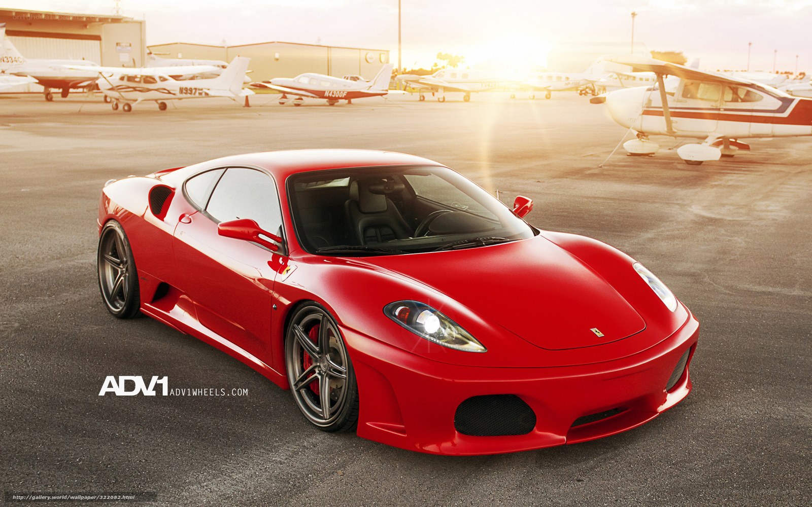 Red Ferrari on airfield