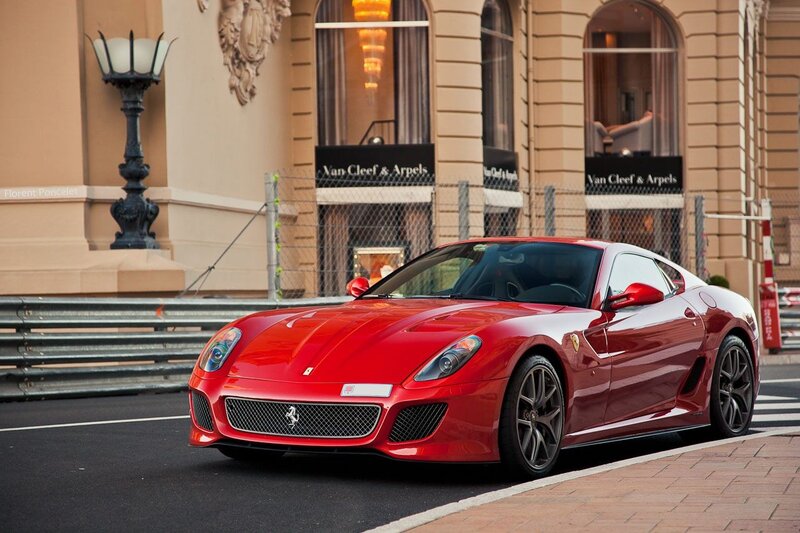 Red Ferrari on city street