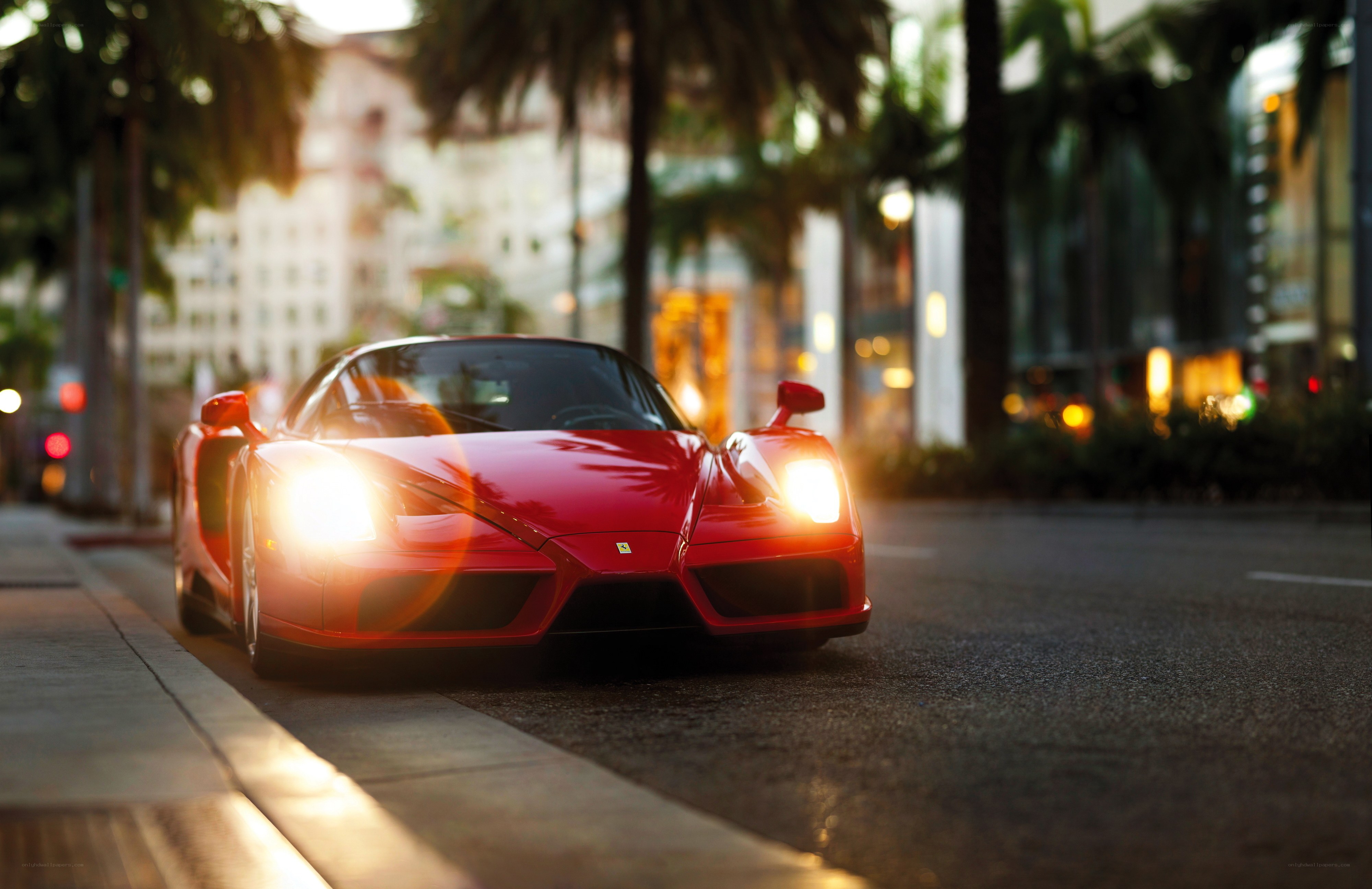 Red Ferrari on city street