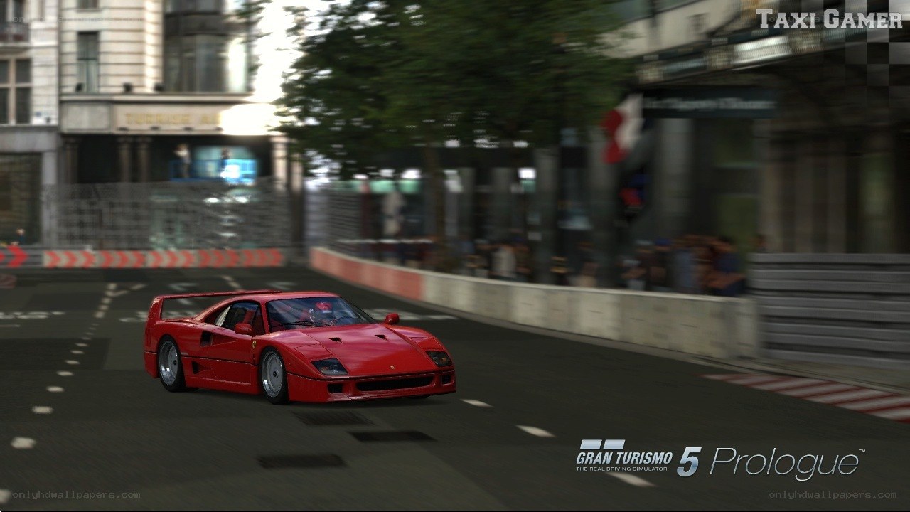 Red Ferrari on city track