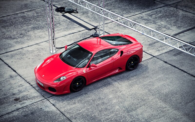 Red Ferrari on concrete