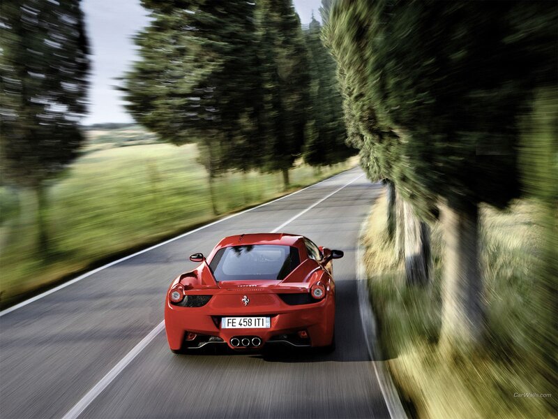 Red Ferrari on country road