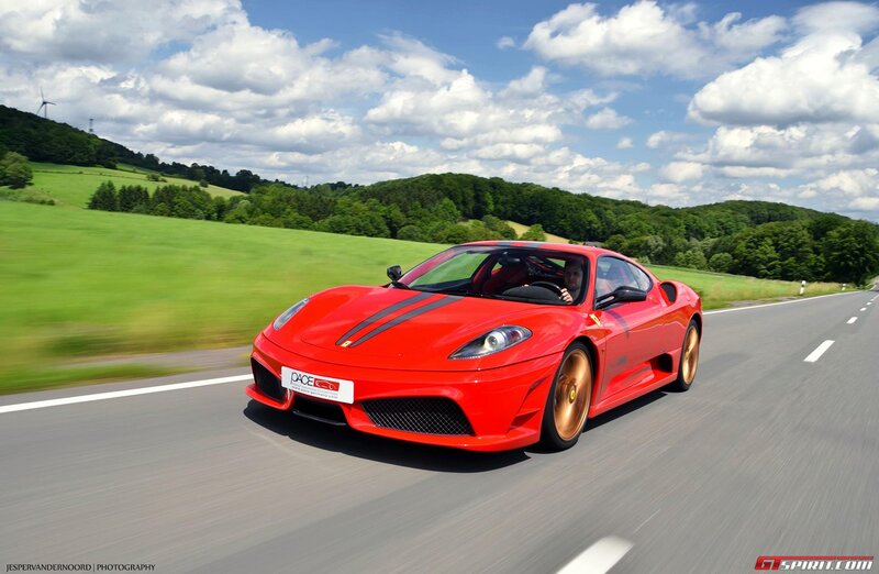 Red Ferrari on country road