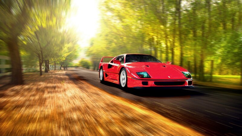 Red Ferrari on country road