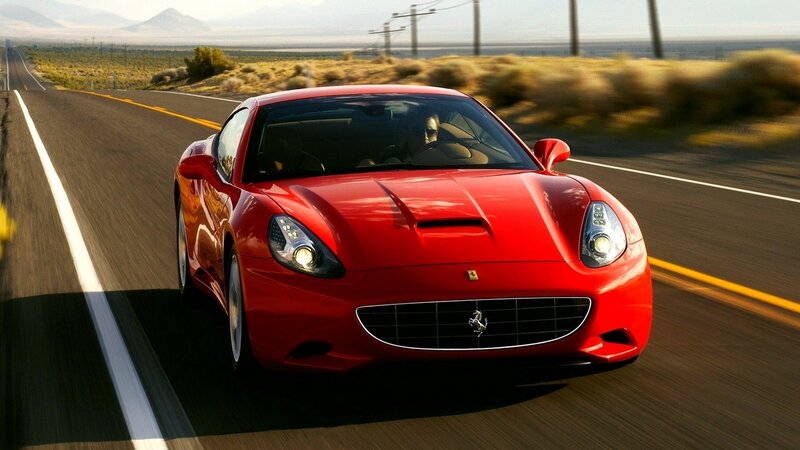 Red Ferrari on desert road