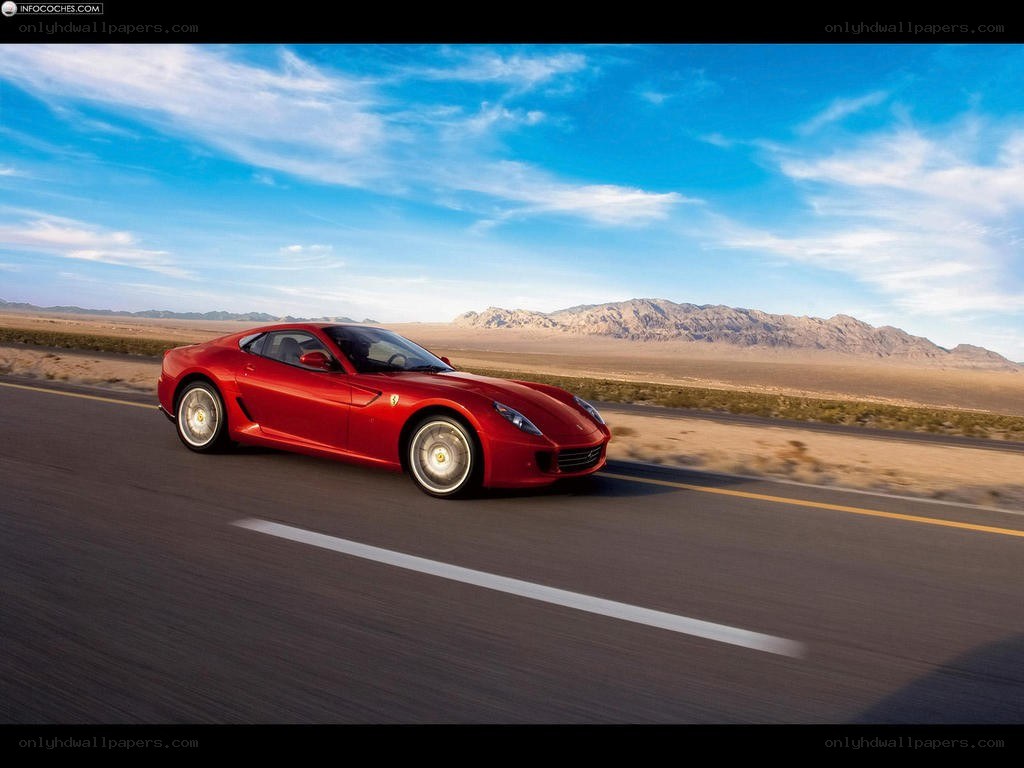 Red Ferrari on desert road
