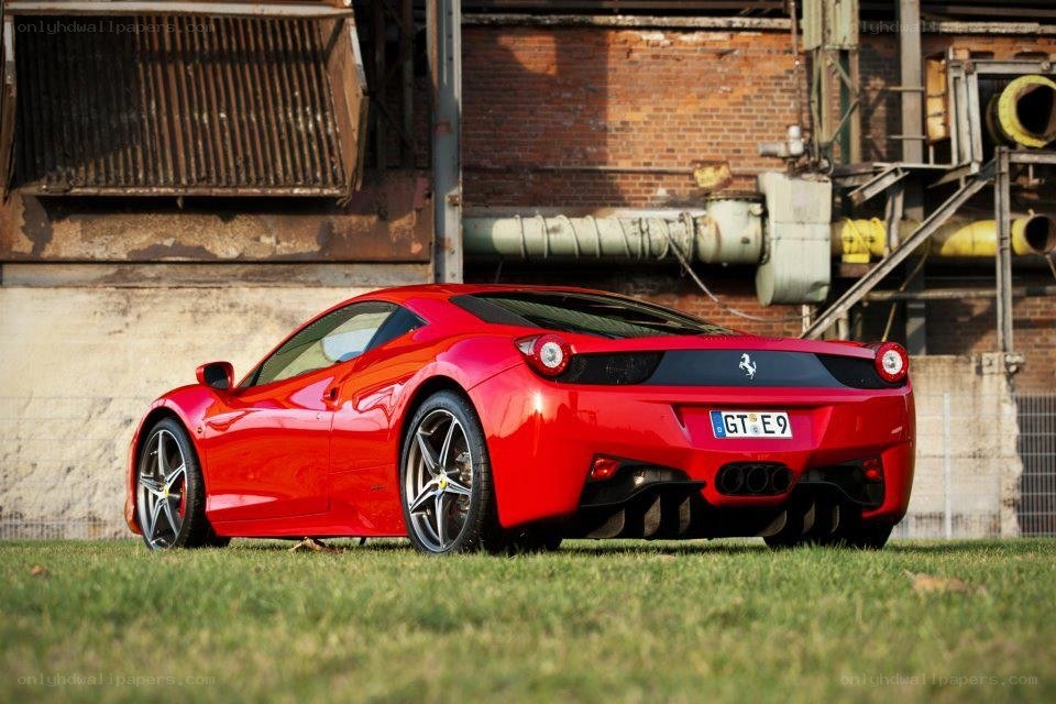 Red Ferrari on grass