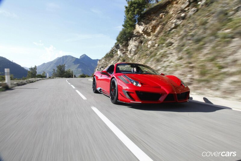 Red Ferrari on mountain road