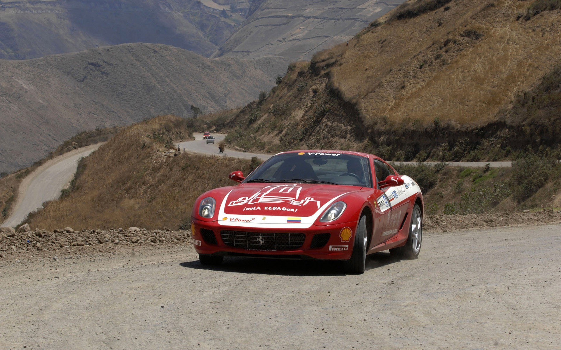 Red Ferrari on mountain road