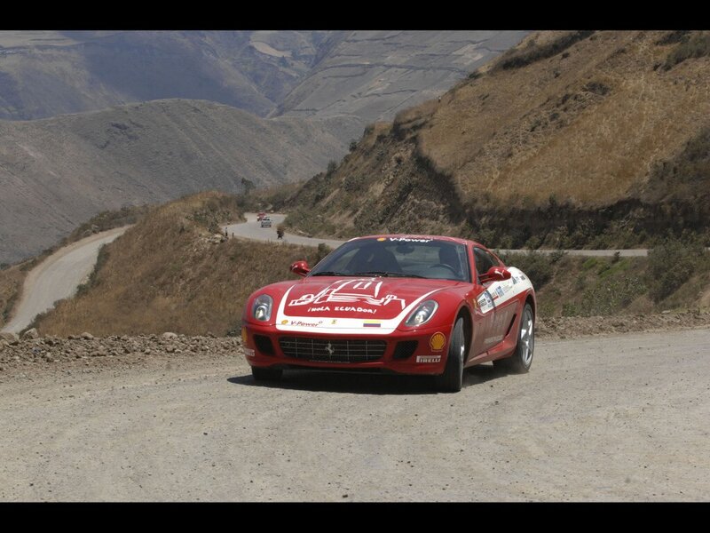 Red Ferrari on mountain road