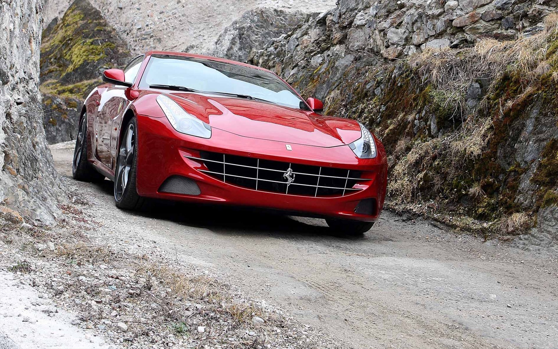 Red Ferrari on mountain road