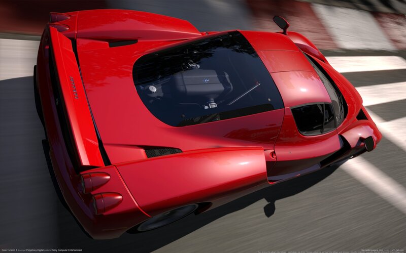 Red Ferrari on racetrack