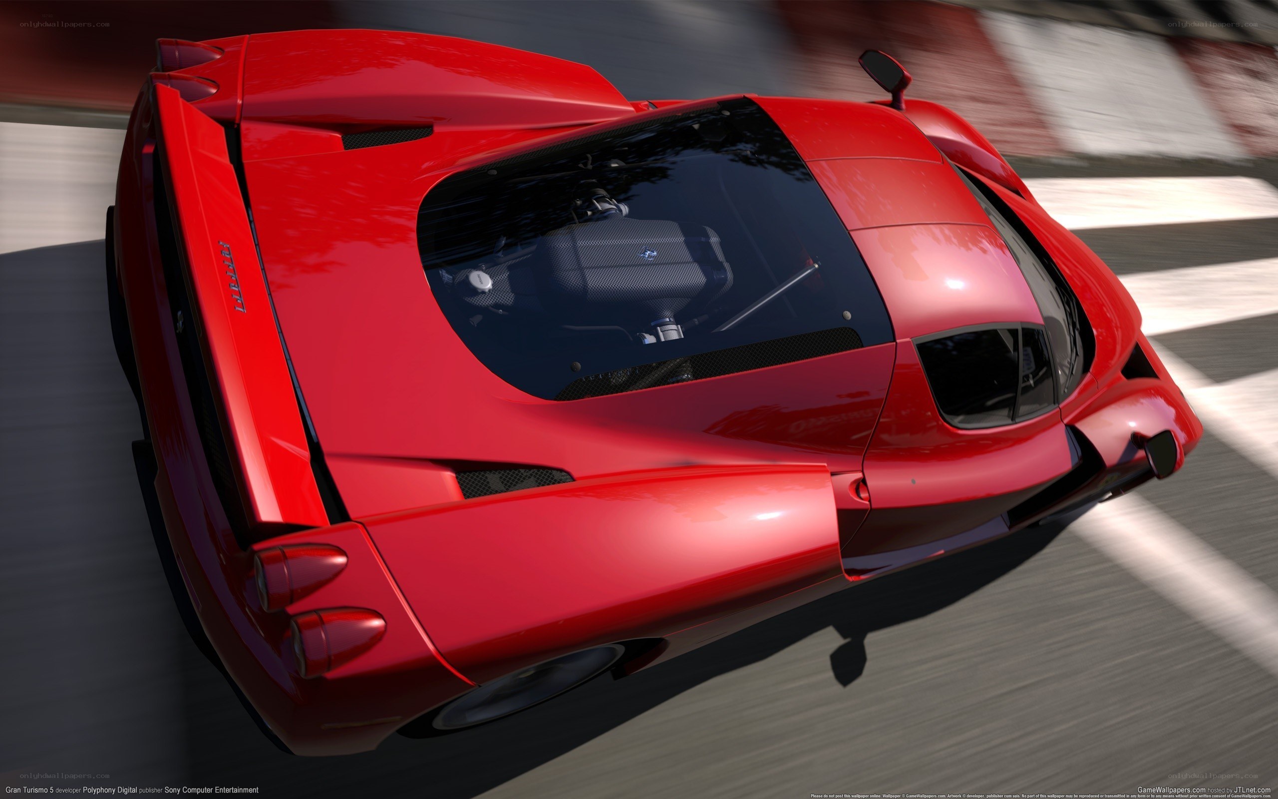 Red Ferrari on racetrack