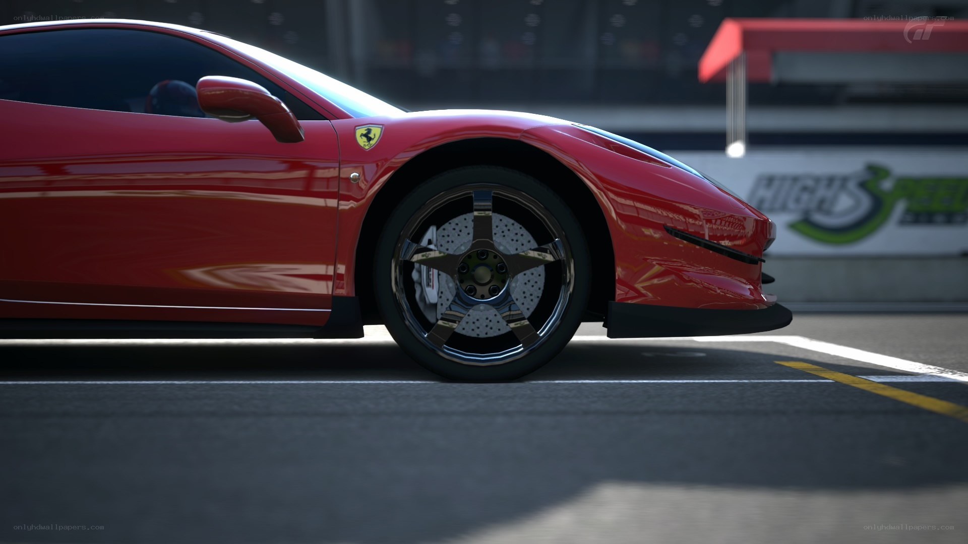 red ferrari on racetrack