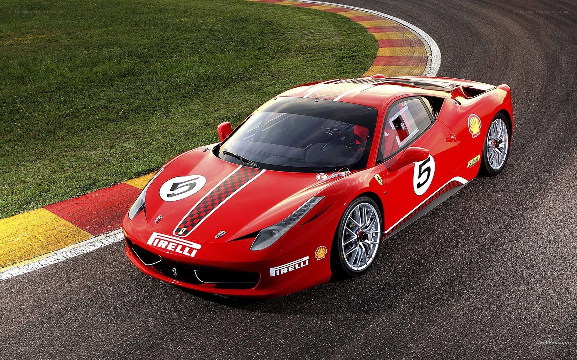 Red Ferrari on racetrack