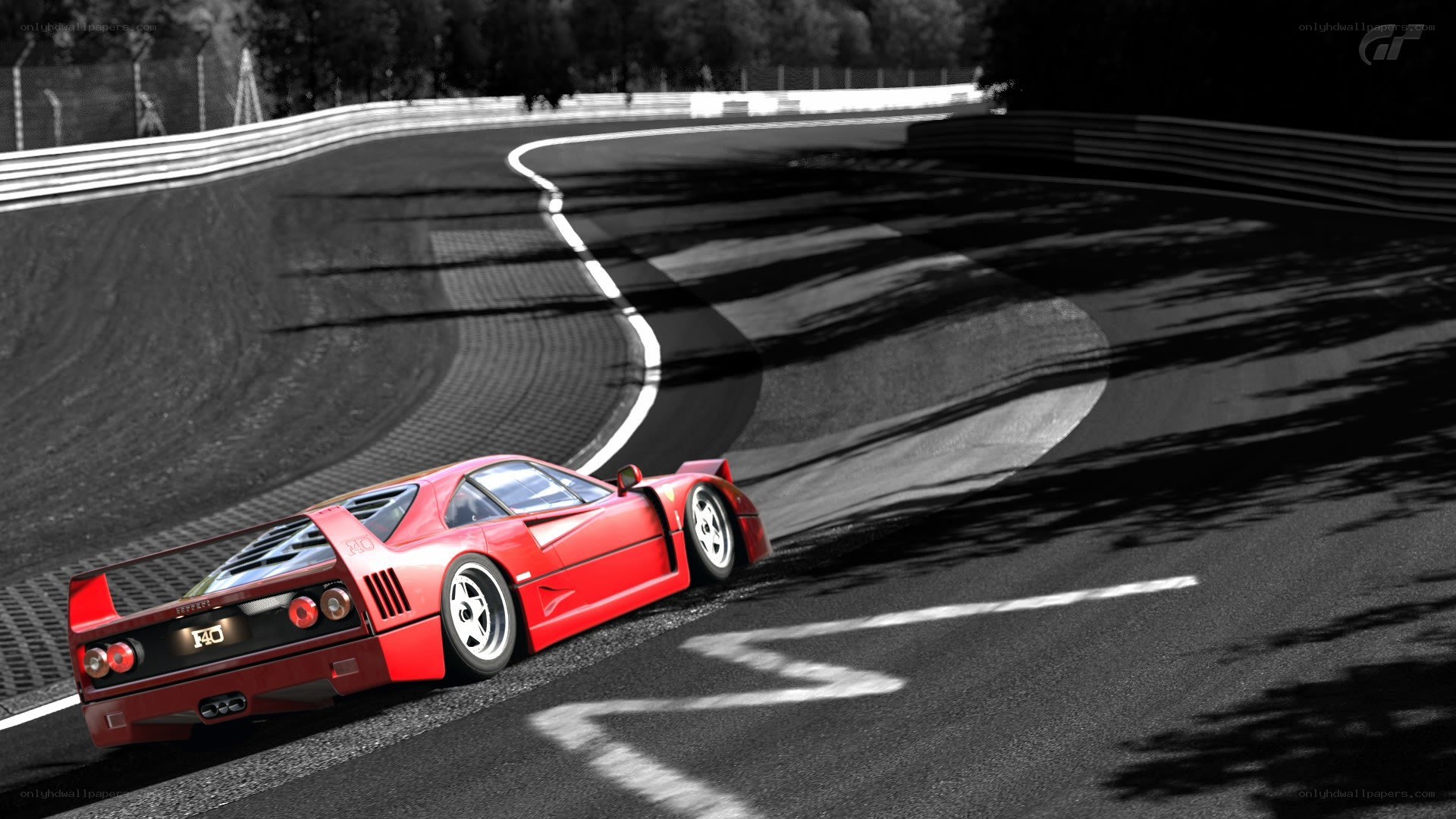 Red Ferrari on racetrack