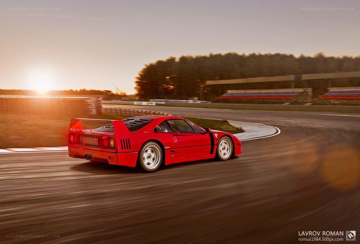 Red Ferrari on racetrack