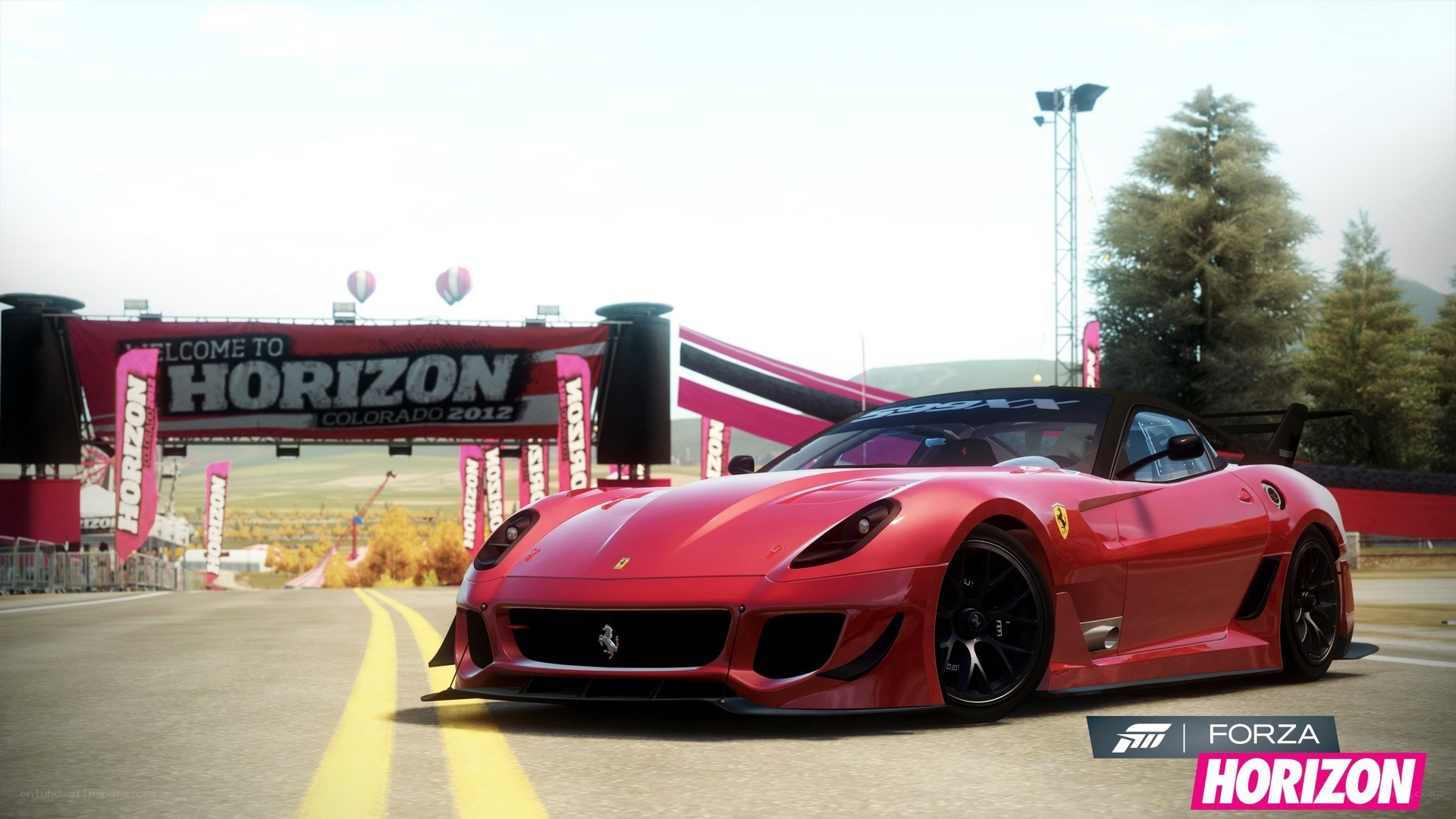 Red Ferrari on racetrack