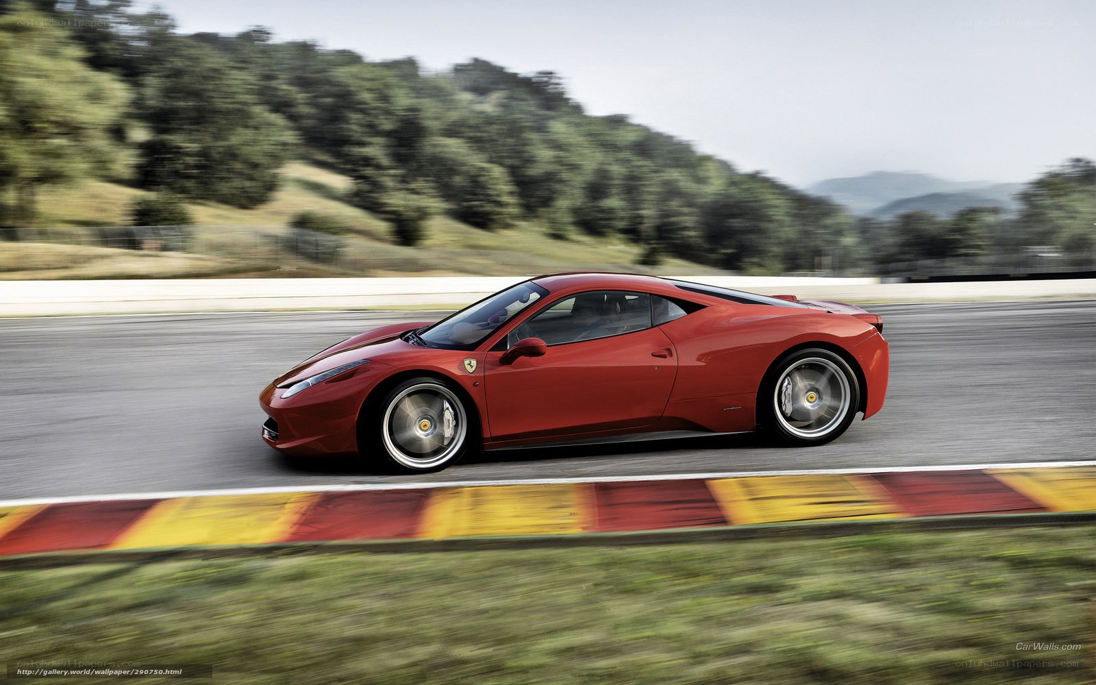 Red Ferrari on racetrack
