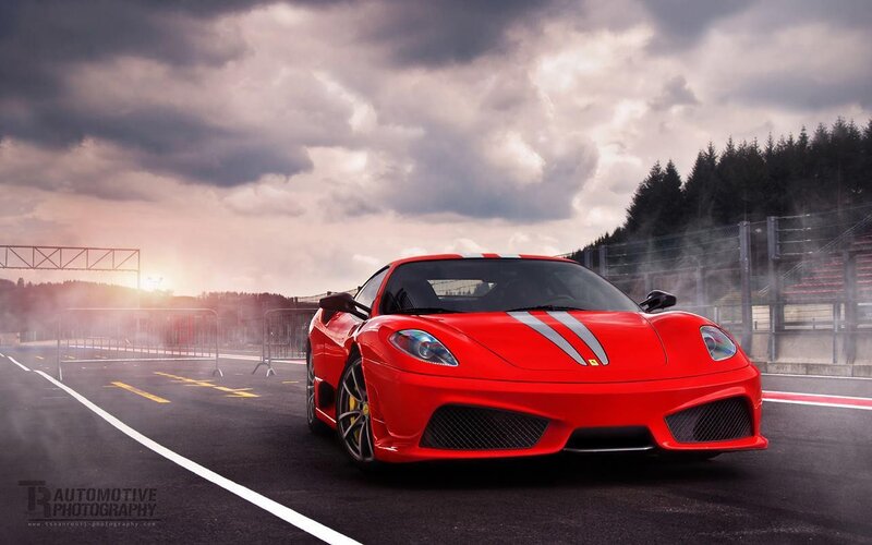 Red Ferrari on Racetrack — Dramatic, Sunset, Photograph, Clouds
