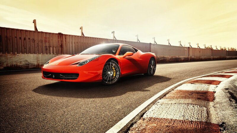 Red Ferrari on Racetrack — Dramatic