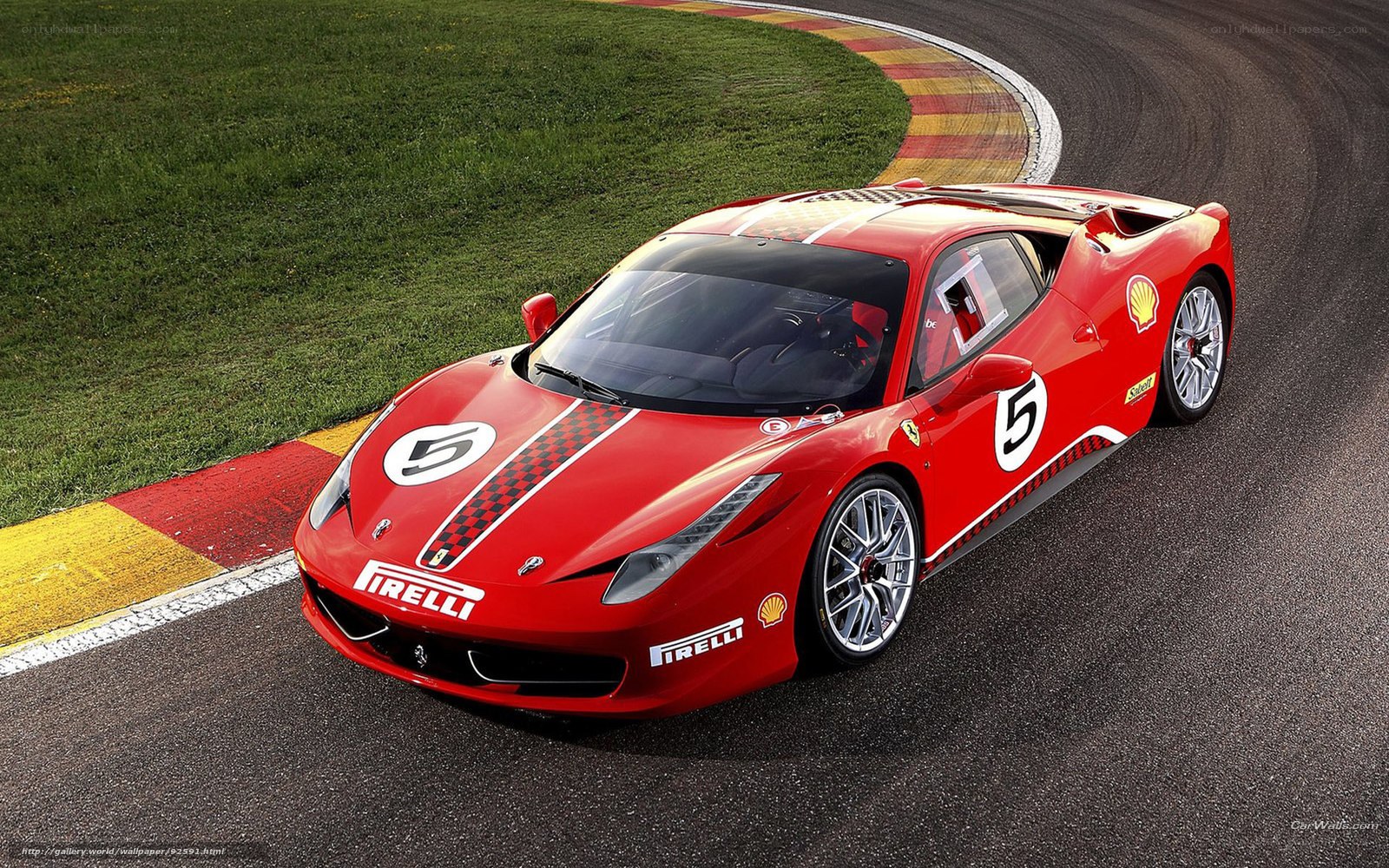 Red Ferrari on racetrack