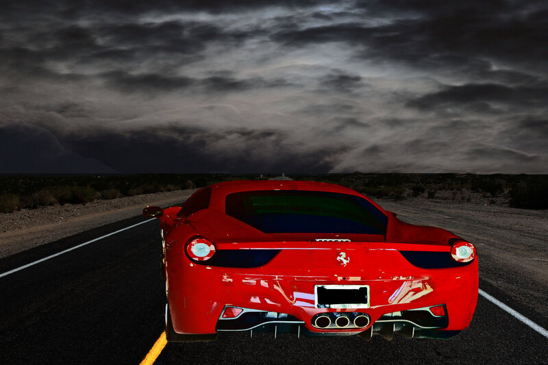Red Ferrari on Road — Dramatic, Night
