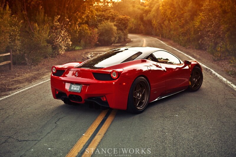 Red Ferrari on Road — Dramatic, Sunset, Photograph