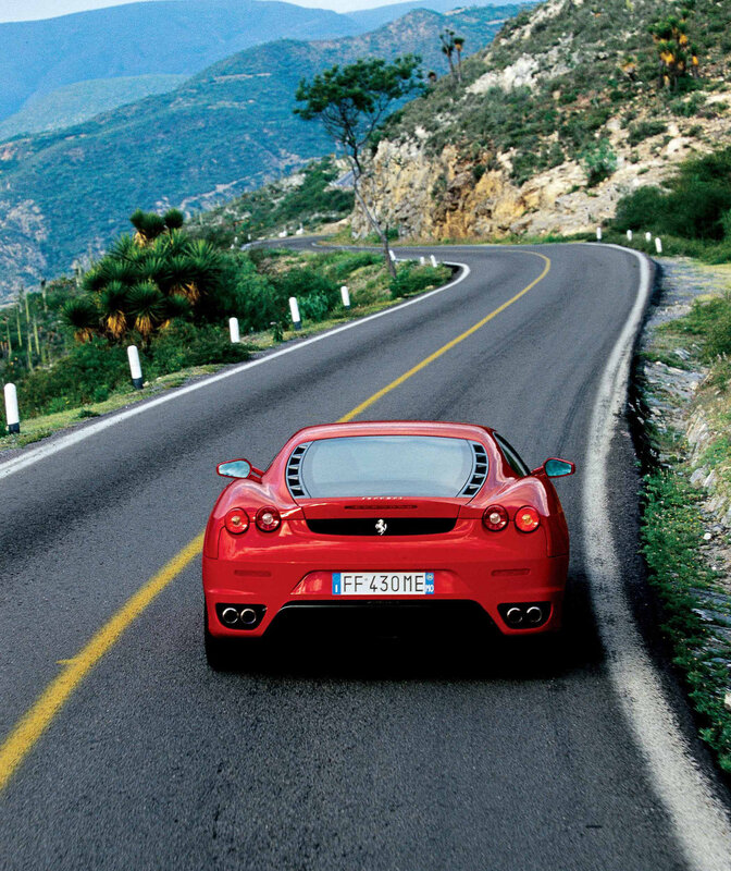 Red Ferrari on Road — Serene, Afternoon, Photograph, Car