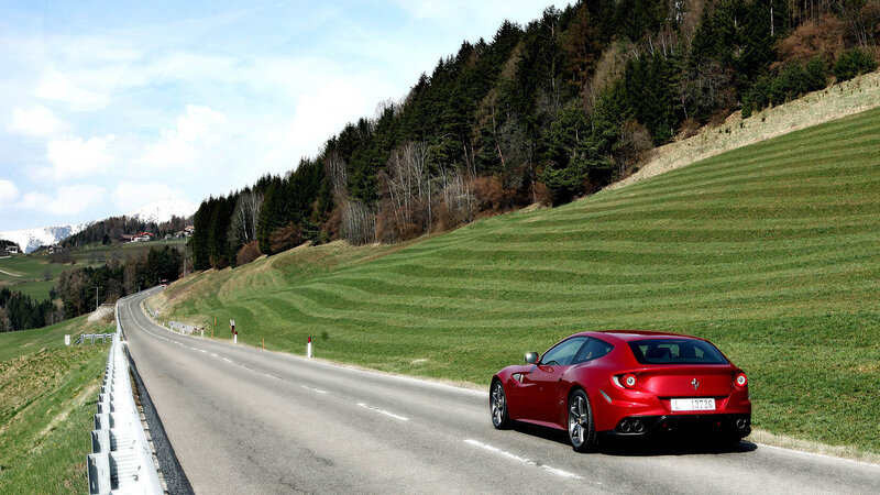 Red Ferrari on Road — Serene, Spring