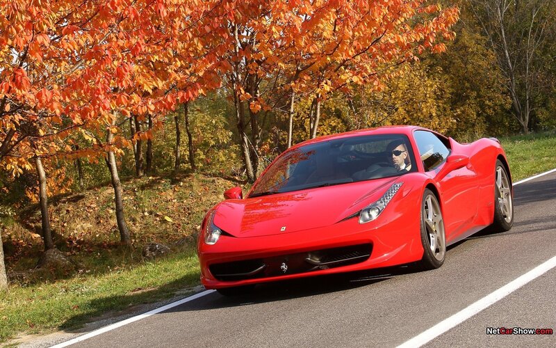 Red Ferrari on Road — Serene