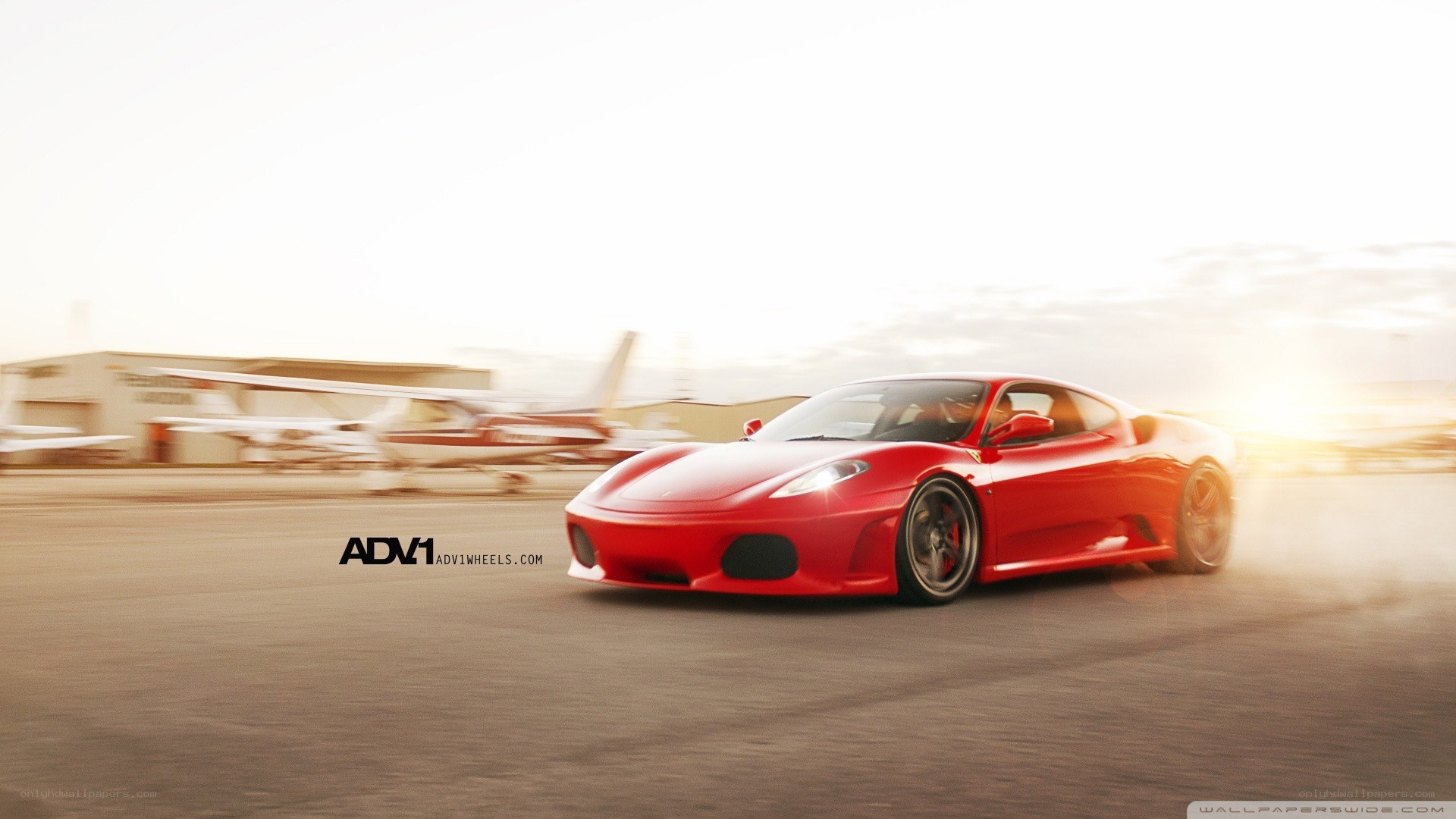 Red Ferrari on runway