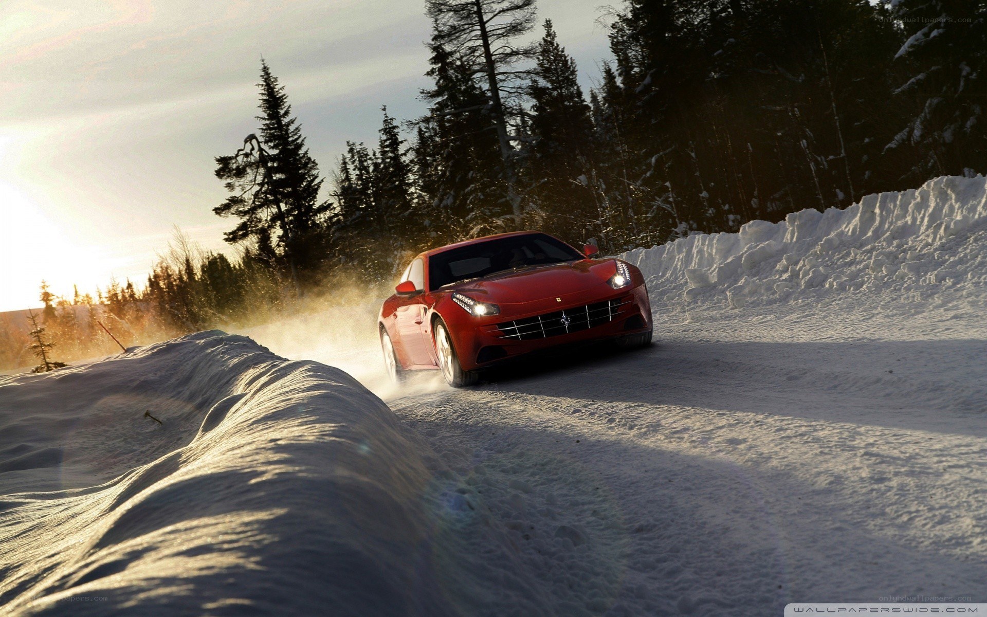 Red Ferrari on snowy road