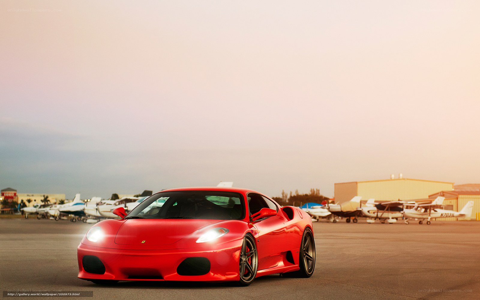 Red Ferrari on tarmac