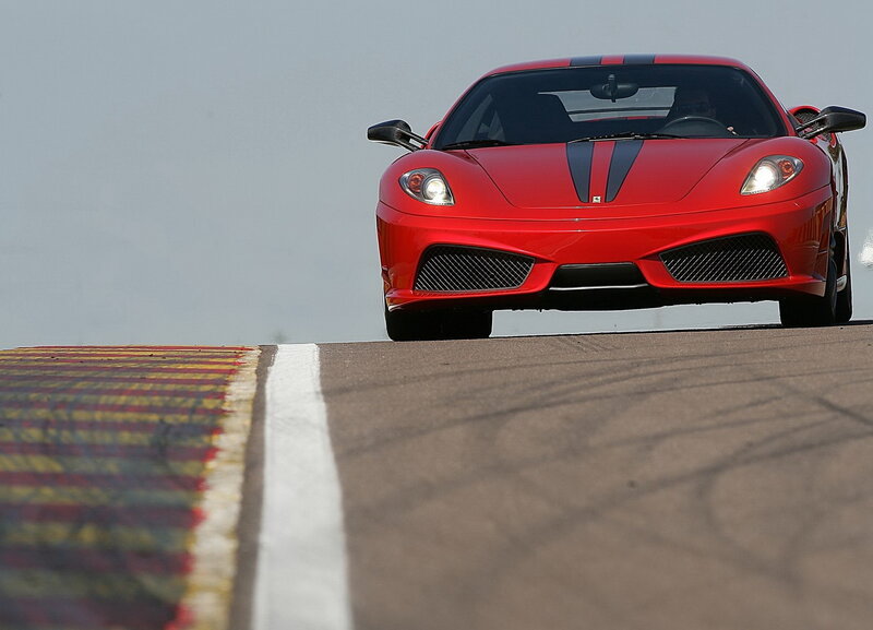 Red Ferrari on Track — Dynamic, Photograph