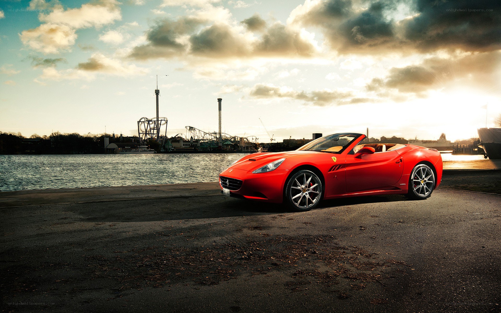 Red Ferrari on waterfront