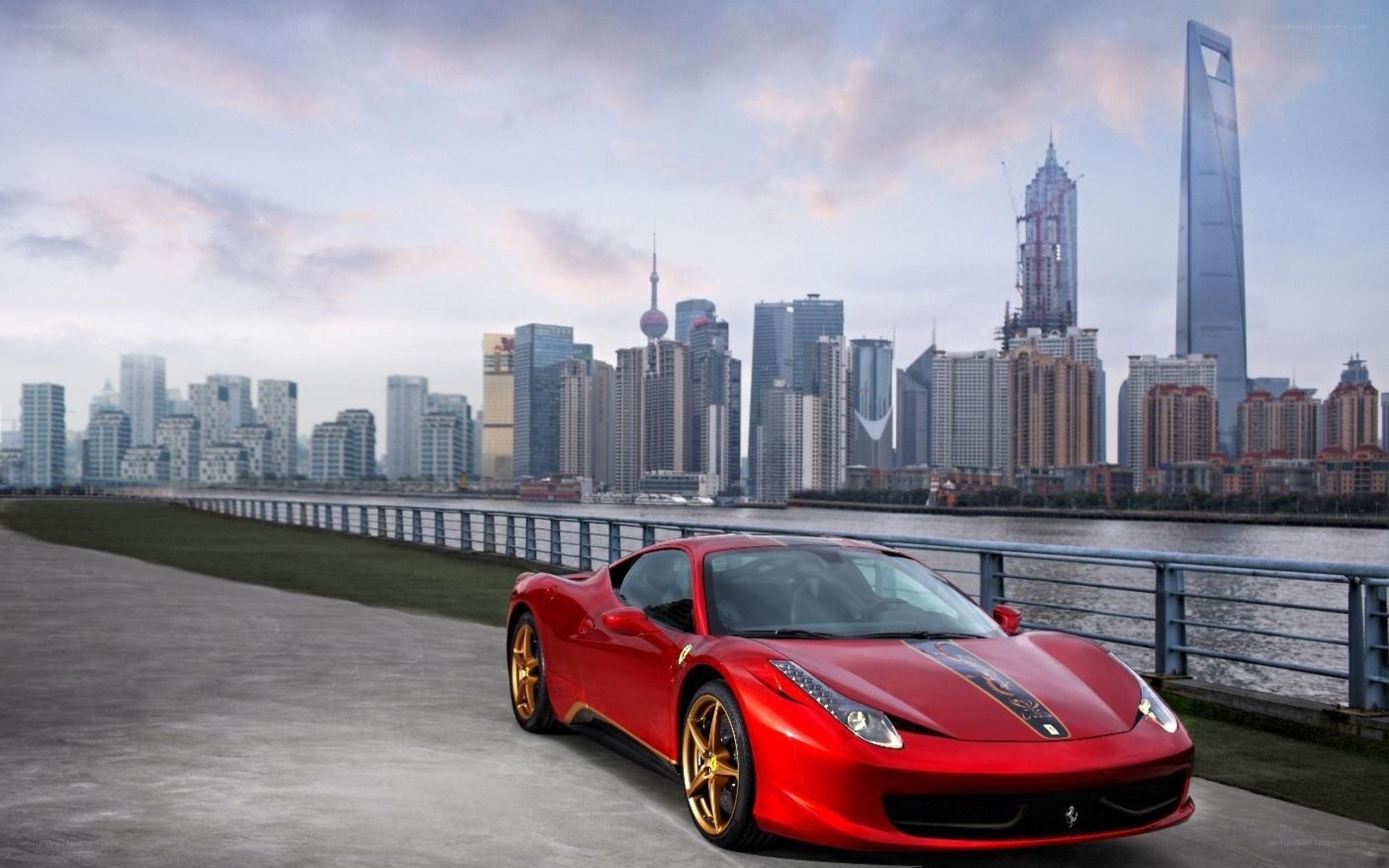 Red Ferrari on waterfront
