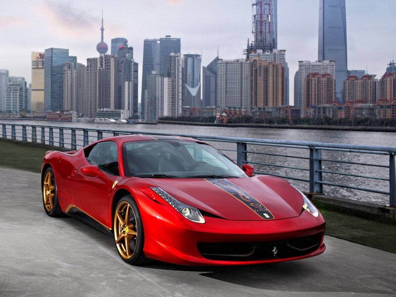 Red Ferrari on waterfront