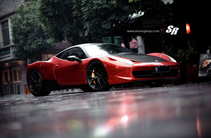 Red Ferrari on Wet Street — Dramatic