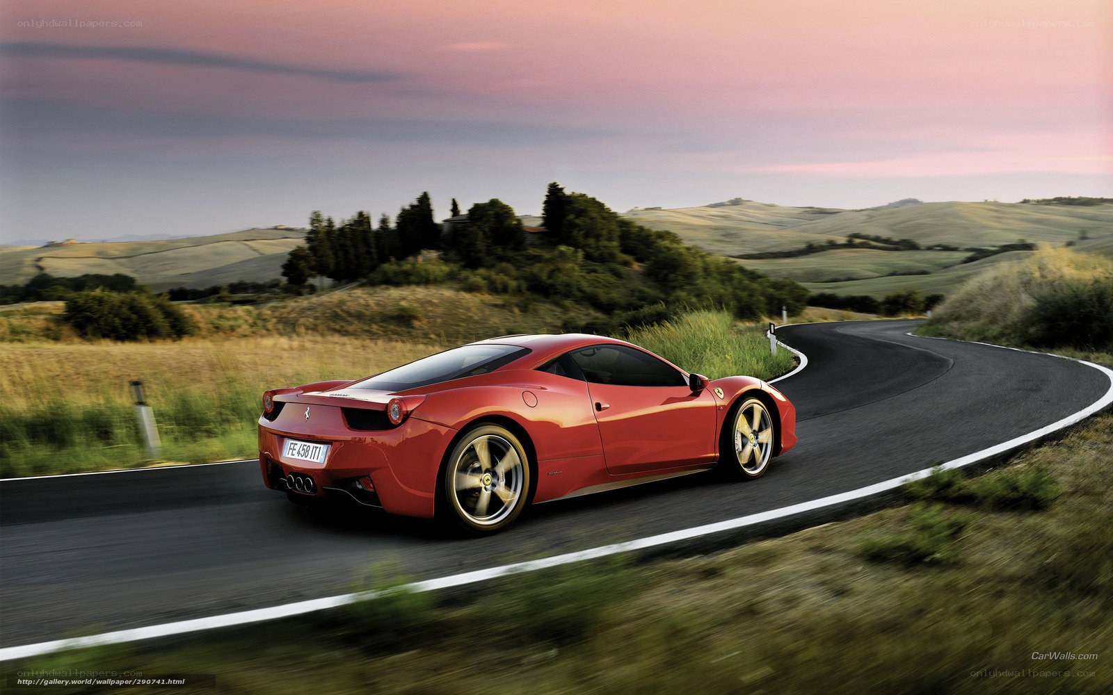 Red Ferrari on winding road
