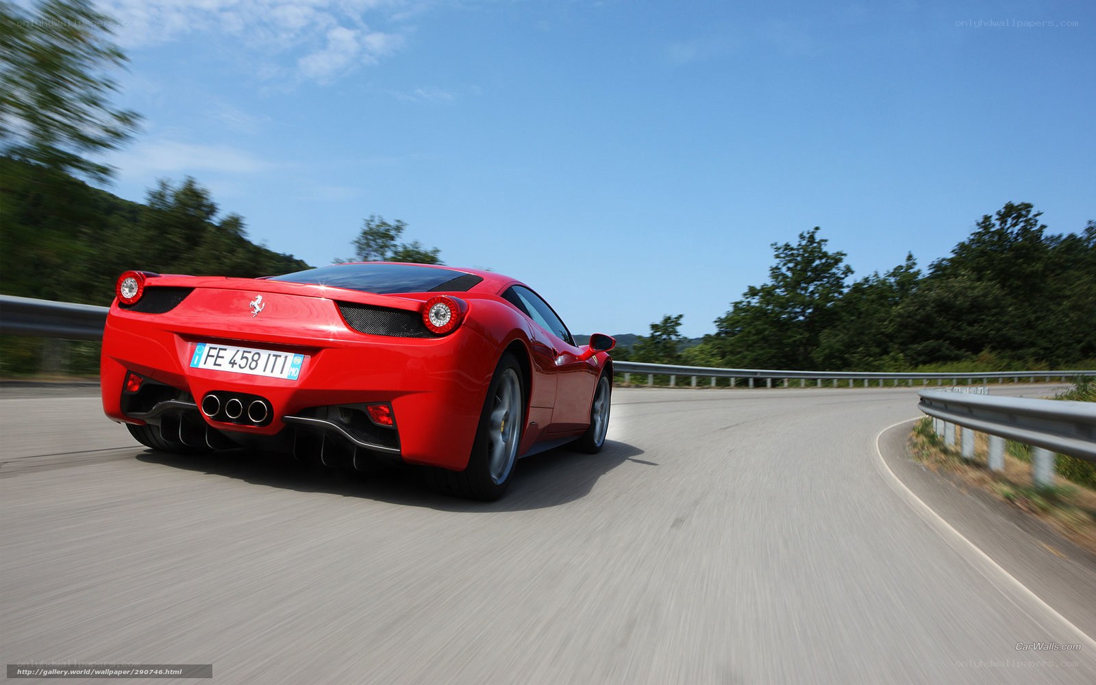Red Ferrari on winding road