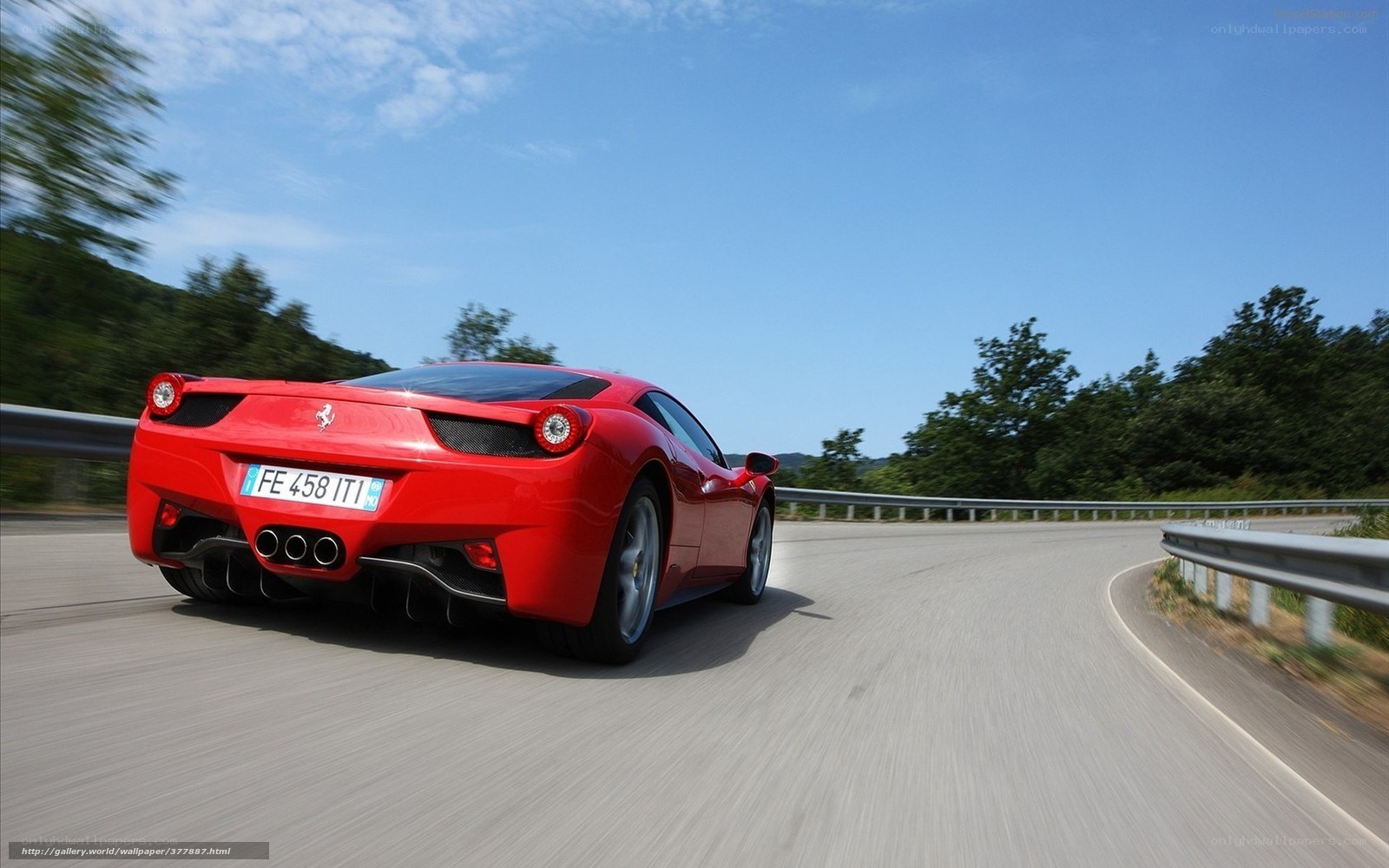 Red Ferrari on winding road