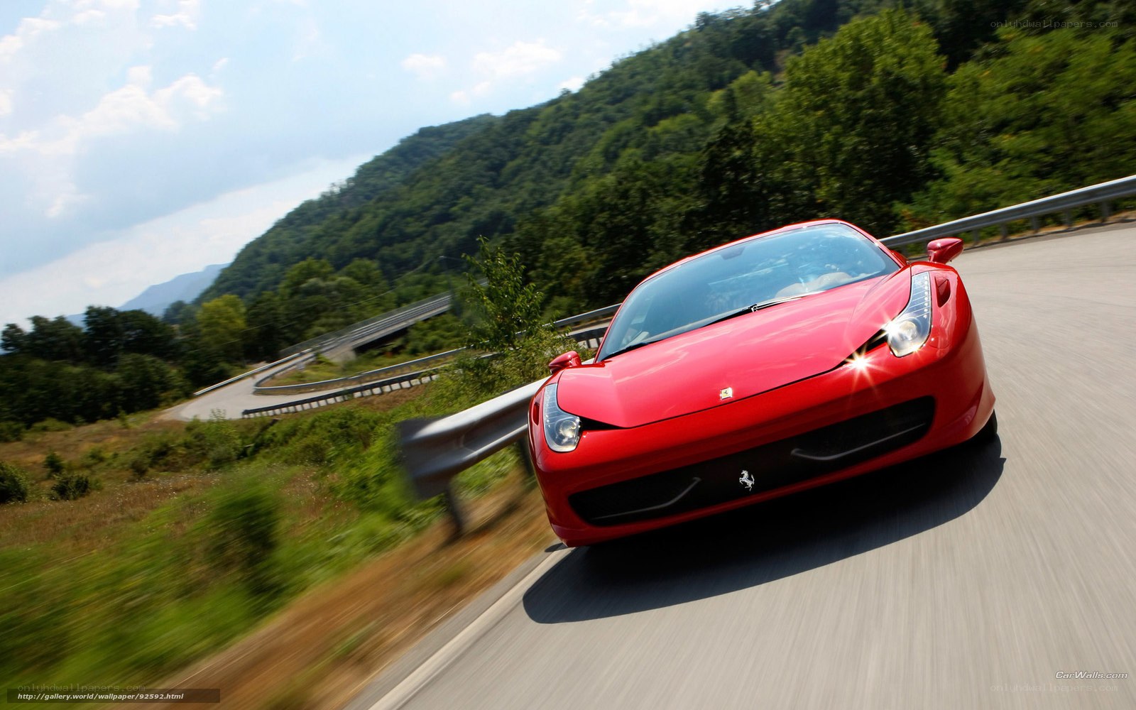 Red Ferrari on winding road