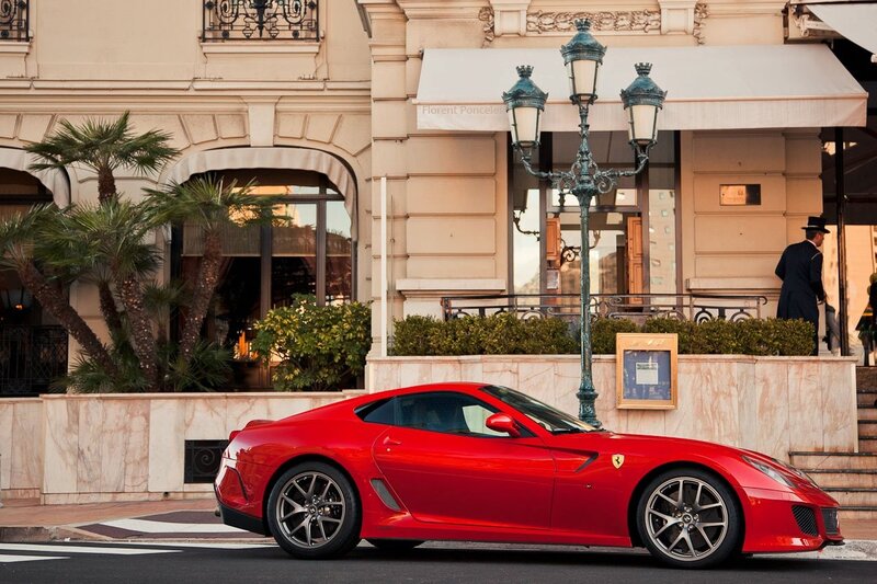 Red Ferrari parked in Monaco