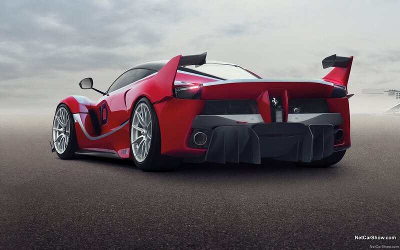 Red Ferrari Race Car — Dramatic, Photograph, Race Track, Cloudy Sky
