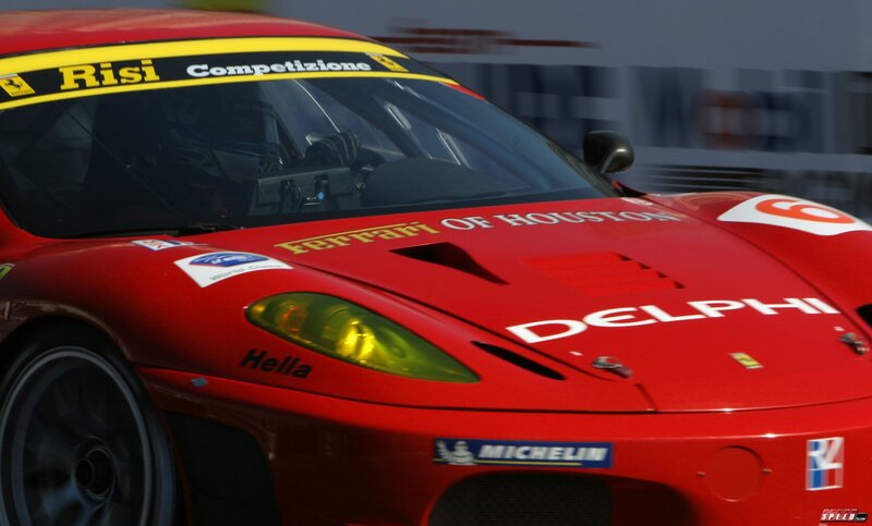 Red Ferrari race car in action